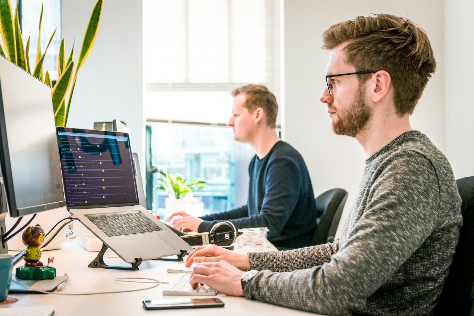 Engineers working together in a bright office